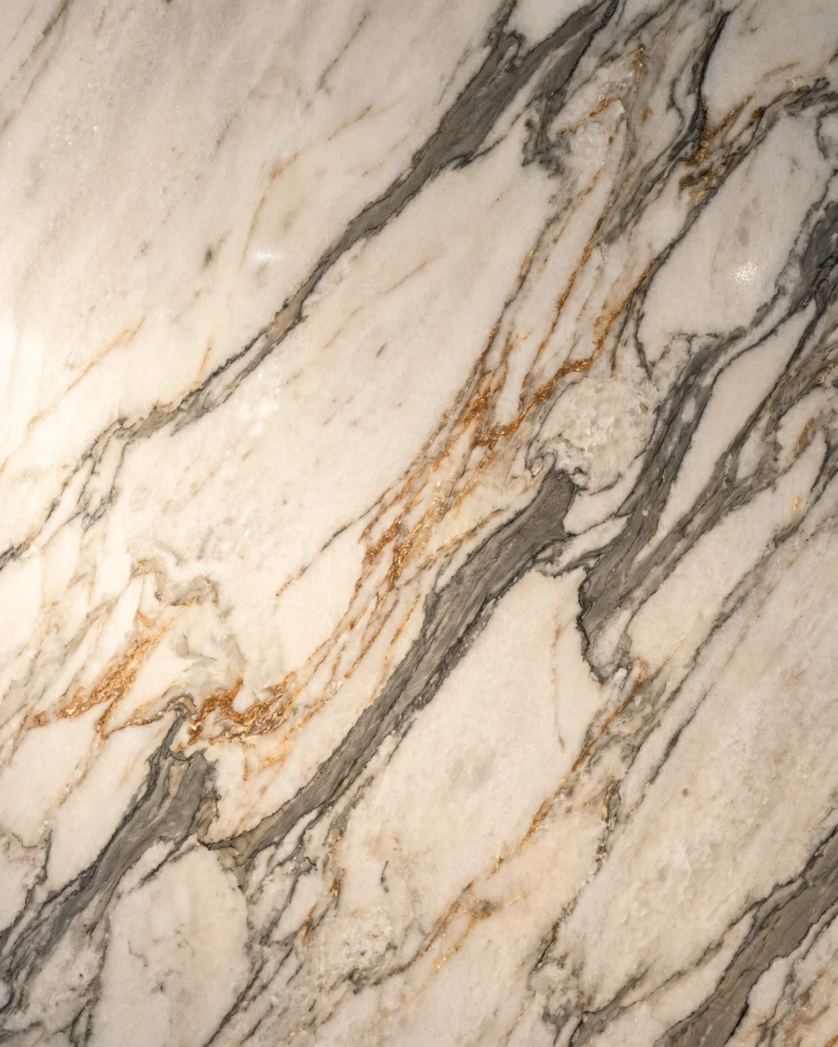 White marble slab with grey-gold veining