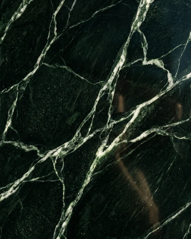 Deep green marble with white veining